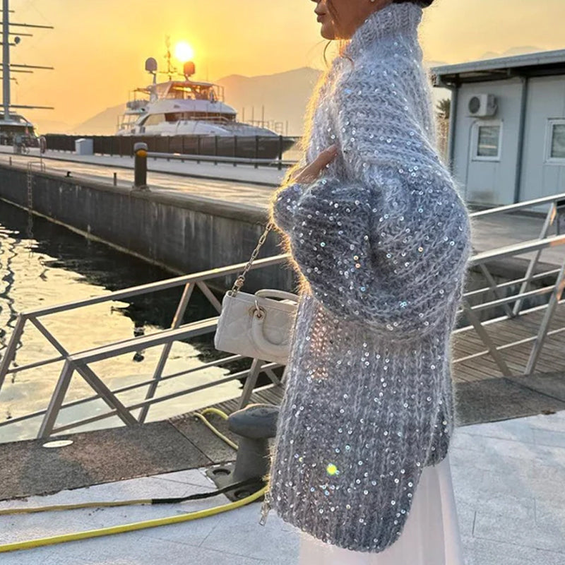 Sweater strikket med ensfarvede glimmer